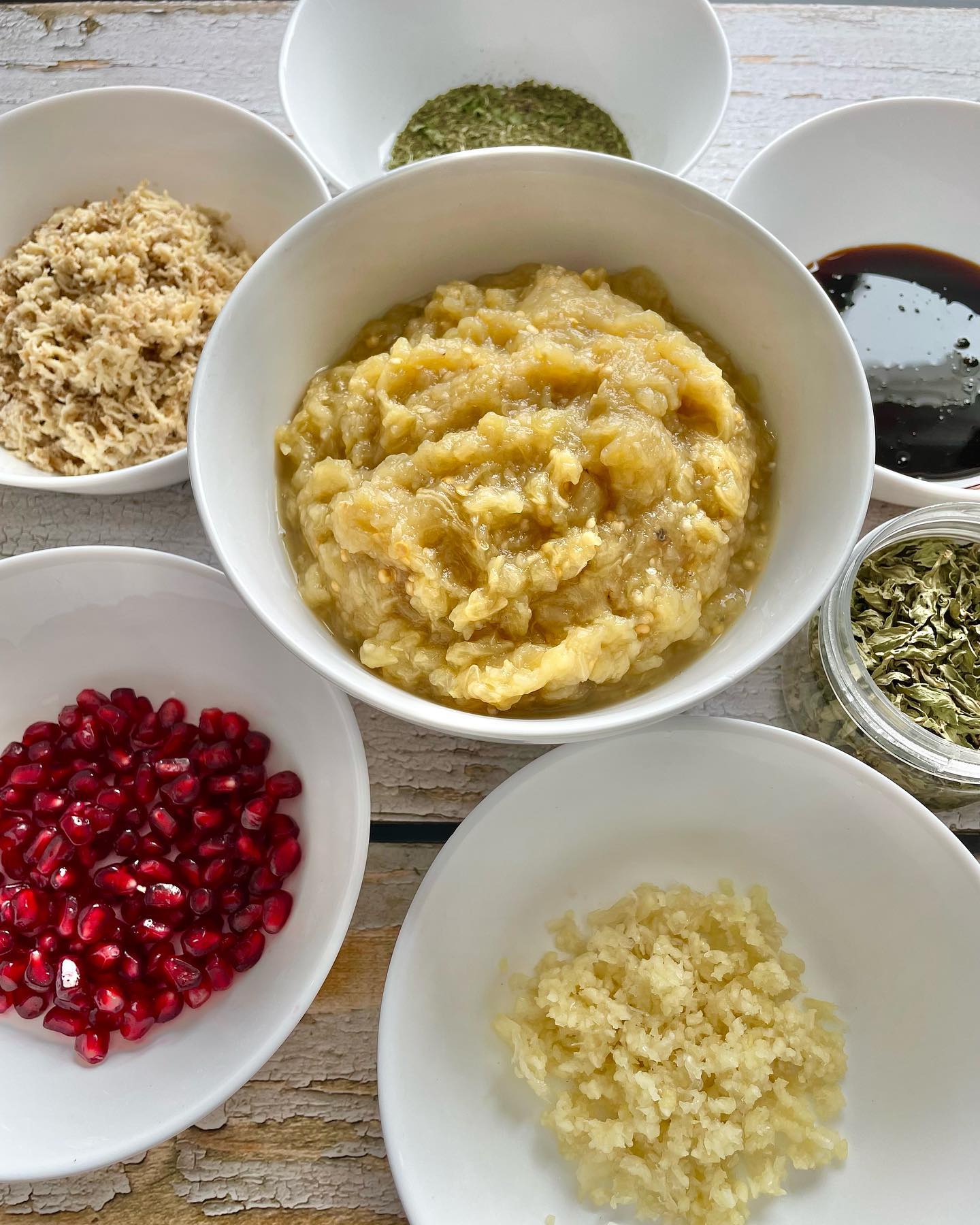 - ππΌπππ ππΌπ½πΌπ½ - THE ULTIMATE #PERSIAN #VEGAN RECIPE
- α΄
α΄/ α΄α΄α΄ΙͺΚ κ°α΄Κ α΄α΄ΚΚα΄Κκ±
Itβs not a regular Kabab recipe post. It's just the name of a totally Persian vegan dish!
The Persian cuisine is extremely rich, & the northern parts of Iran have very unique dishes made with loads of herbs - especially wild & rare ones that not many are familiar with, primarily used as aromatics.
Of major notability, is the herb pronounced as "Choochagh" - or Eryngium Coucasicum. It is a herb used in the northern part of Iran to make "Zeytoon Parvardeh" (a decadent mixture of olives, walnuts, pomegranate molasses, & herbs, and "Morgh e Torsh" - translated as Sour Chicken, with spinach, cilantro, and split peas.
Another fabulous aromatic herb is "Khalvash". Apparently it is a wild variety of the mint family, and the closest translation I could get for it is "Kotkotoo".
SO grateful that I had inventory left from my mom's visit, otherwise this post would be toast!
Now on to the Kaleh Kabab. This vegan decadence is a unique side (or main), and I truly believe the full authentic recipe is still up for debate. My late grandmother and her elder cousins always argued over it!
Here's what I put together from the best of my knowledge and recollection. I hope Iβve made all the Rashti & Pahlavichi folks happy with this post π
I made this with @shallyzomorodi in mind, who is my new distant relative and her heart and soul are deeply entwined with our cuisine! Dear Shally, if you end up checking this out, let me know if you have a different recipe.
You would need:
> 4 eggplants
> 14 walnuts, shelled, pressed
> one small bulb garlic, pressed
> 1 tbsp dried mint
> 1 tbsp dried Khalvash
> 1 tbsp dried Chouchagh
> about half a cup of sour pomegranate juice, or sour grape juice (Aab Ghooreh)
> S&P
> Pomegranate arils for texture & garnish
Slice belly of eggplants, grill on charcoal fire or in the oven. Keep turning the eggplants until all sides are cooked.
Cool down & remove their seeds.
Pulse eggplants in a food processor, then mix in pressed garlic & walnuts, pomegranate juice, S&P. Adjust to taste.
I hope you enjoy this nostalgic goodness as well!